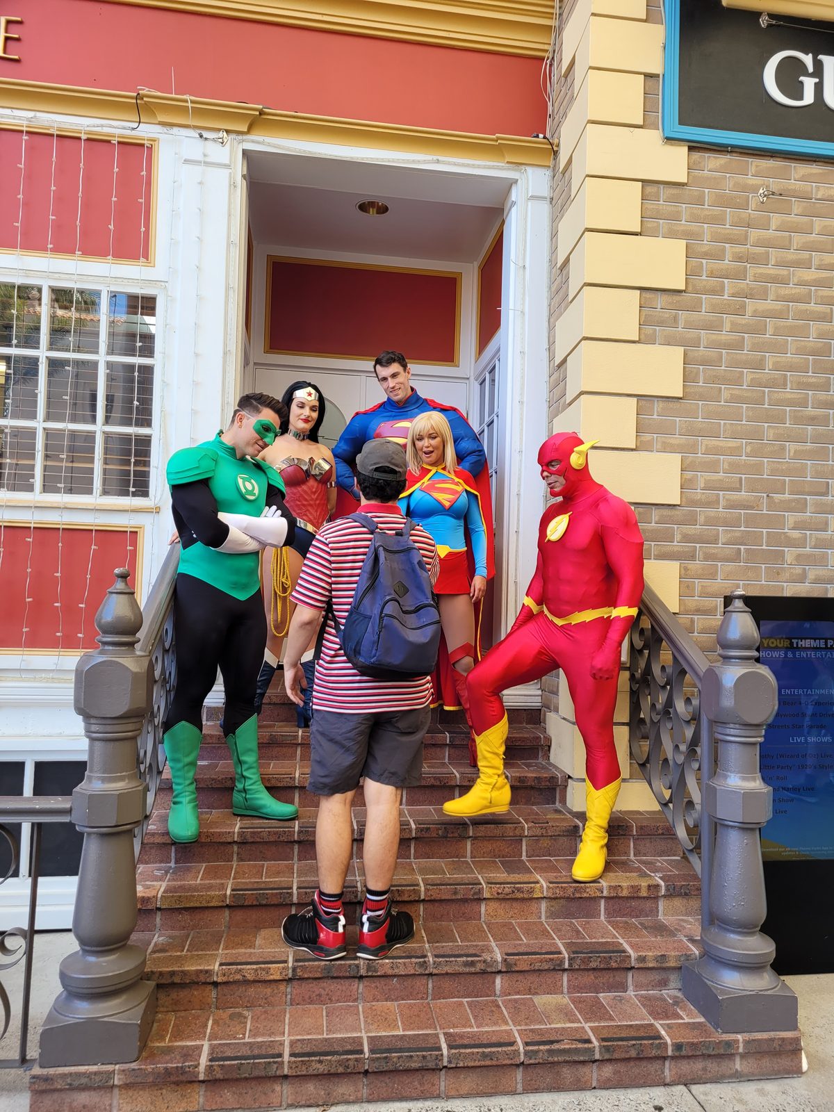 A participant checking out the superhero displays at Movie World
